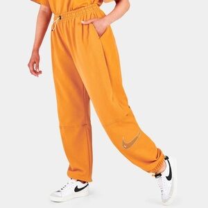 Nike Orange Track Pants with Swoosh